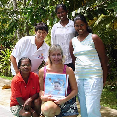Our first three qualified Sri Lankan Swimming Teachers, Pauline Wijesinthe, Inki Abeyratna and Anisha Srimanti, with project founder Chris Fonfe and visiting Volunteer, STA Tutor Sue Brown, who helped run their course and examinations